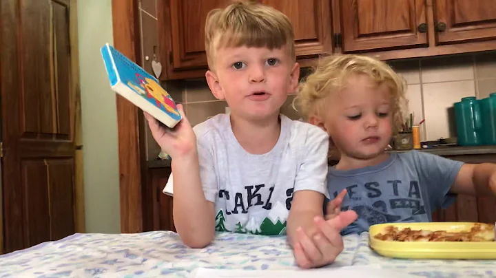 Stephen (4), reading to Ruben