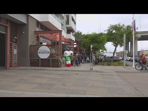 Customers wait in long line as Las Cuatro Milpas opens at new Barrio Logan location