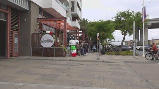 Customers wait in long line as Las Cuatro Milpas opens at new Barrio Logan location