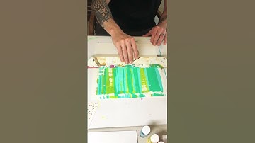 Scraping Paint - laying down the ground of a new painting www.thebazaarstudio.com