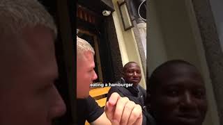 Kenyan man's reaction trying a hamburger for the first time 🇰🇪