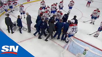 Jake Evans Stretchered Off Ice After Huge Hit From Mark Scheifele Following Empty Net Goal