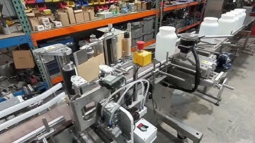 Automatic Gallon Piston Filler by No Limits Packaging Systems Corp
