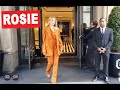Rosie Huntington looking quite fashionable in orange in NYC