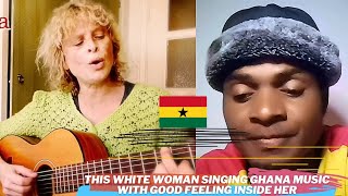 This white woman singing Ghana music with happiness