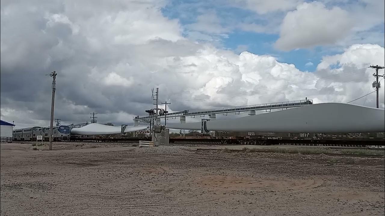 BNSF Wind Turbine passes the California Zephyr at Bartley, Nebraska on