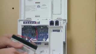 Untested 600-1054-95R-11 Lot Of 24 GE Simon XT Alarm Control Panels 