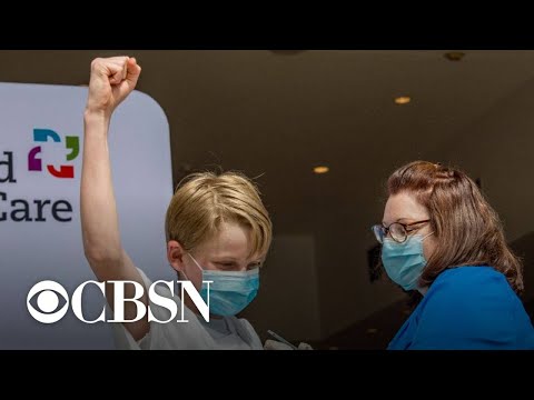 Thousands of U.S. kids line up for COVID shots as the CDC updates mask guidance