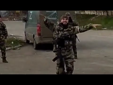 Chechen soldier performing folk “lezginka” dance in Mariupol.