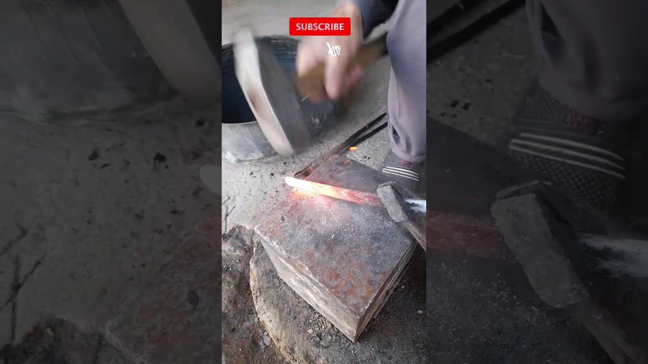 blacksmith making a sickle handle, blacksmith makes a daranti with power hammer,  skill