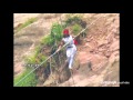 Chinese acrobat survives tightrope fall