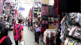 This is a walk up and down tung choi street in the mong kok section of
kowloon, on mainland side hong kong. it goes for many blocks, you can
br...