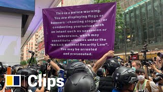 Subscribe to our channel for free here: https://sc.mp/clipssubscribe
hong kong police raised a new purple flag during anti-government
protests on jul...