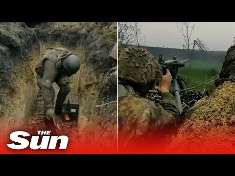 Belarusian's fighting for Ukraine fire a Browning M2 machine gun at Russian positions