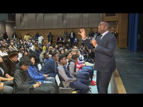 Magic Johnson talks with Ballou High School students