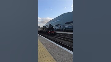 The Nunney Castle  (5029) flying through Platform 5 at Exeter St Davids with a Class 57 (57311)