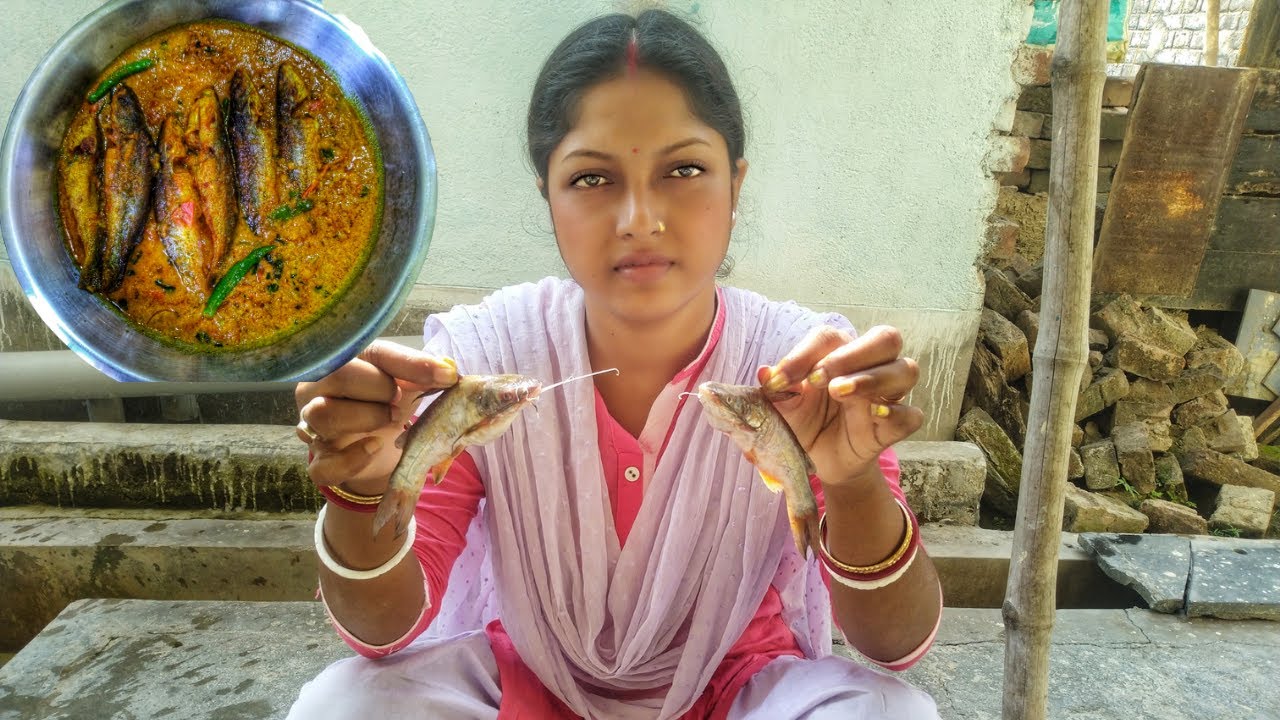 Tribal woman cooking 