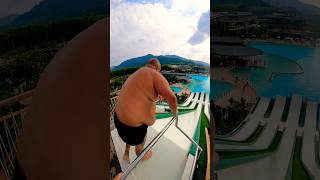 BIG MAN slip’n’slide jump at Blue Tree Phuket Thailand 😳 | #watermagic #waterpark #swimming