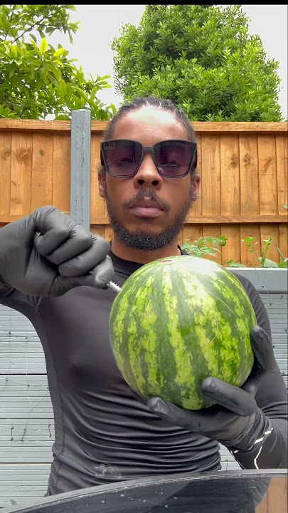 Injecting a watermelon with sodium   potassium (NaK) 🍉💉 #chemistry #science #experiment