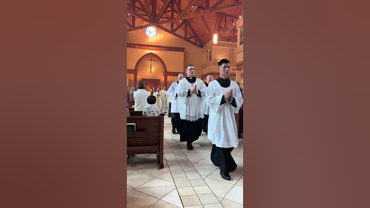 Little boy offers handshake to Priests during procession #catholicmass