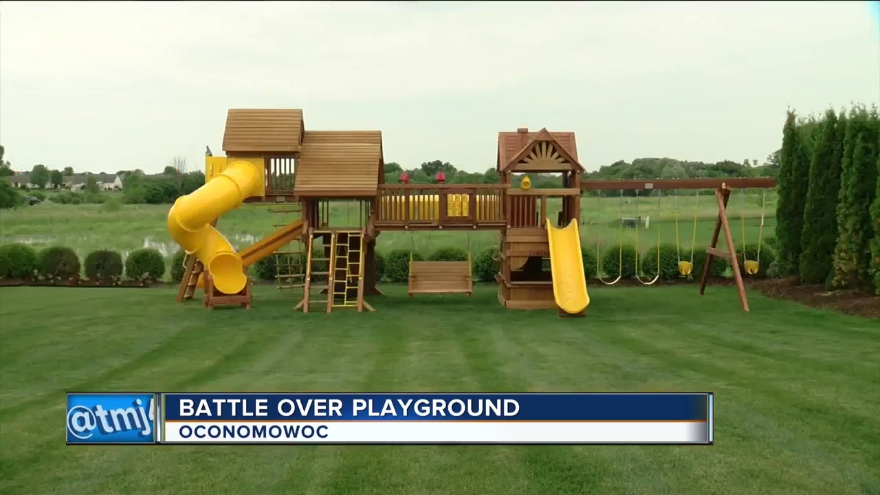 Homeowner's Association says families "12 feet trees" are the problem not child's playground