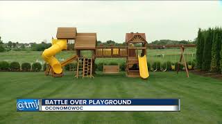 Homeowner's Association says families '12 feet trees' are the problem not child's playground