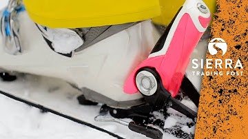Skiing: Getting Into Ski Bindings On A Steep Slope