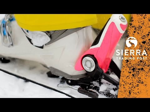 Skiing: Getting Into Ski Bindings On A Steep Slope