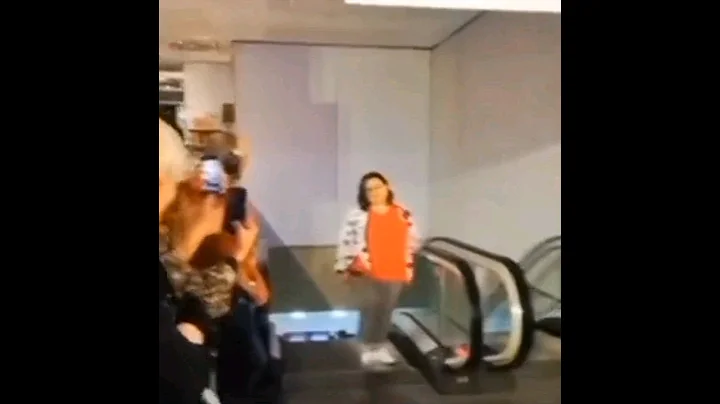 stan twitter: girl walks up escalators while a blackpink cupcakke remix plays