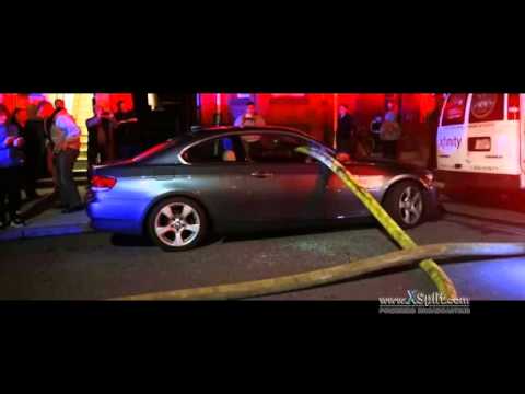 firefighters-smash-bmw's-windows-to-stretch-hose-toward-8-alarm-blaze