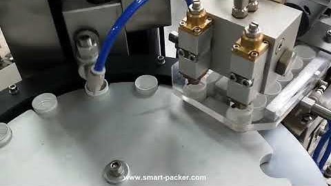 Automatic cap glue filling wad lining assembling machine cap gluing wading machine