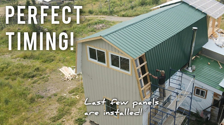We're officially dried in! | GAMBREL ROOF is DONE! | Building Our OFF GRID HOME in the Wilderness