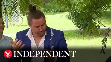 Sign language interpreter pooped on by owl during live news conference