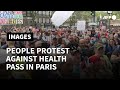 People demonstrate against the health pass in Paris | AFP