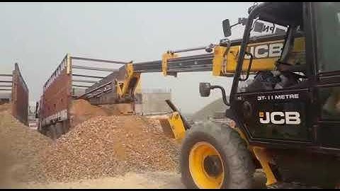 New JCB Telehandler 11 mtr Machine Unloading Concrete 40 m.m. from Truck for Road Construction