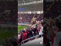 Fans of the Turkish football team toss toys onto the field to be sent to Palestinian children