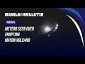 Meteor seen over erupting Mayon Volcano