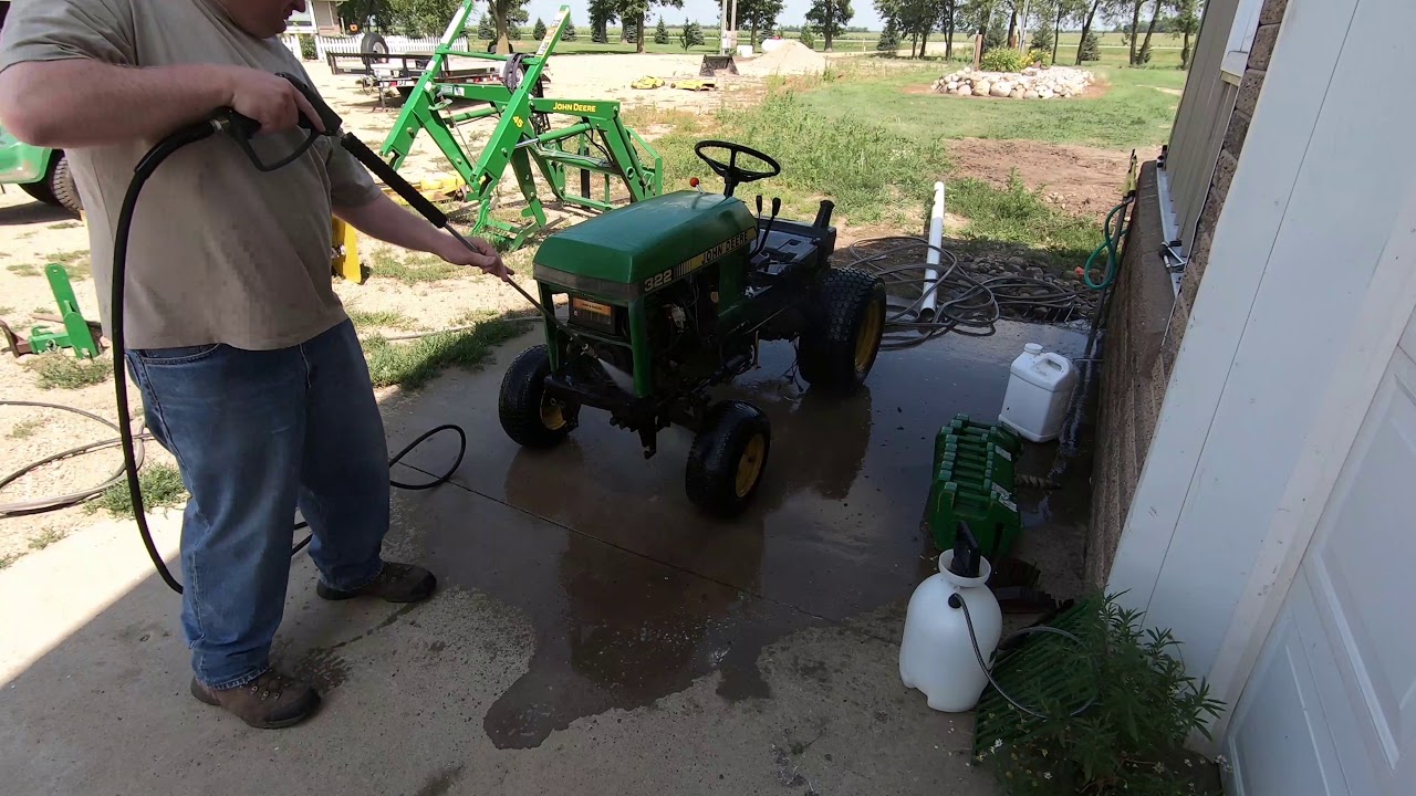 Four John Deere 318's and a 322 Series: Cleaning the 322 - YouTube