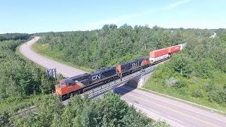 Aerial View - All EMD Power! Long & Slow CN Stack Train 120 w/Mid & Rear DPUs at Berry Mills, NB