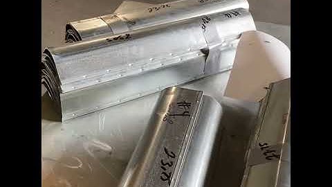 Turning Vanes cut stacked and bundled before being fastened to a Rail on either side then screwed in