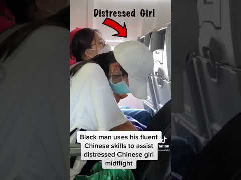 Black man uses his FLUENT Chinese to help distressed passenger MIDFLIGHT !