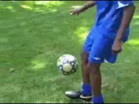 Abdi Adan with a soccer ball somalia