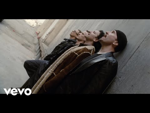 U2 - Stuck In A Moment You Can't Get Out Of (Official Music Video)