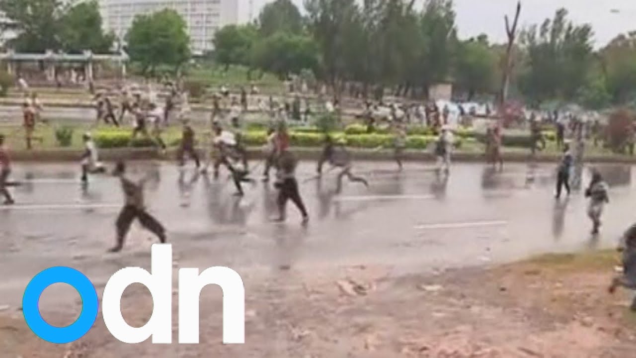 Protesters clash with Pakistan police, storm state TV
