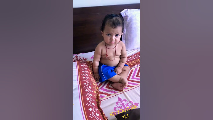 very funny so cute baby Indian boy