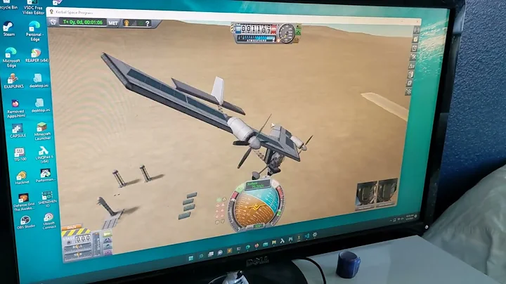 Miles's KSP Airplane does a fly over of his rocket...