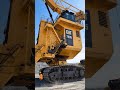 The Cat 7495 is a massive electric rope shovel designed for large-scale surface minin.