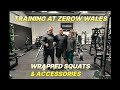 Being coached at zerow wales wrapped squats and leg training accessories