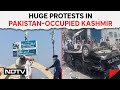 Pok protest  huge protests in pakistanoccupied kashmir cops fire ak47s