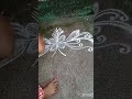 Cuit white line flower rangoli